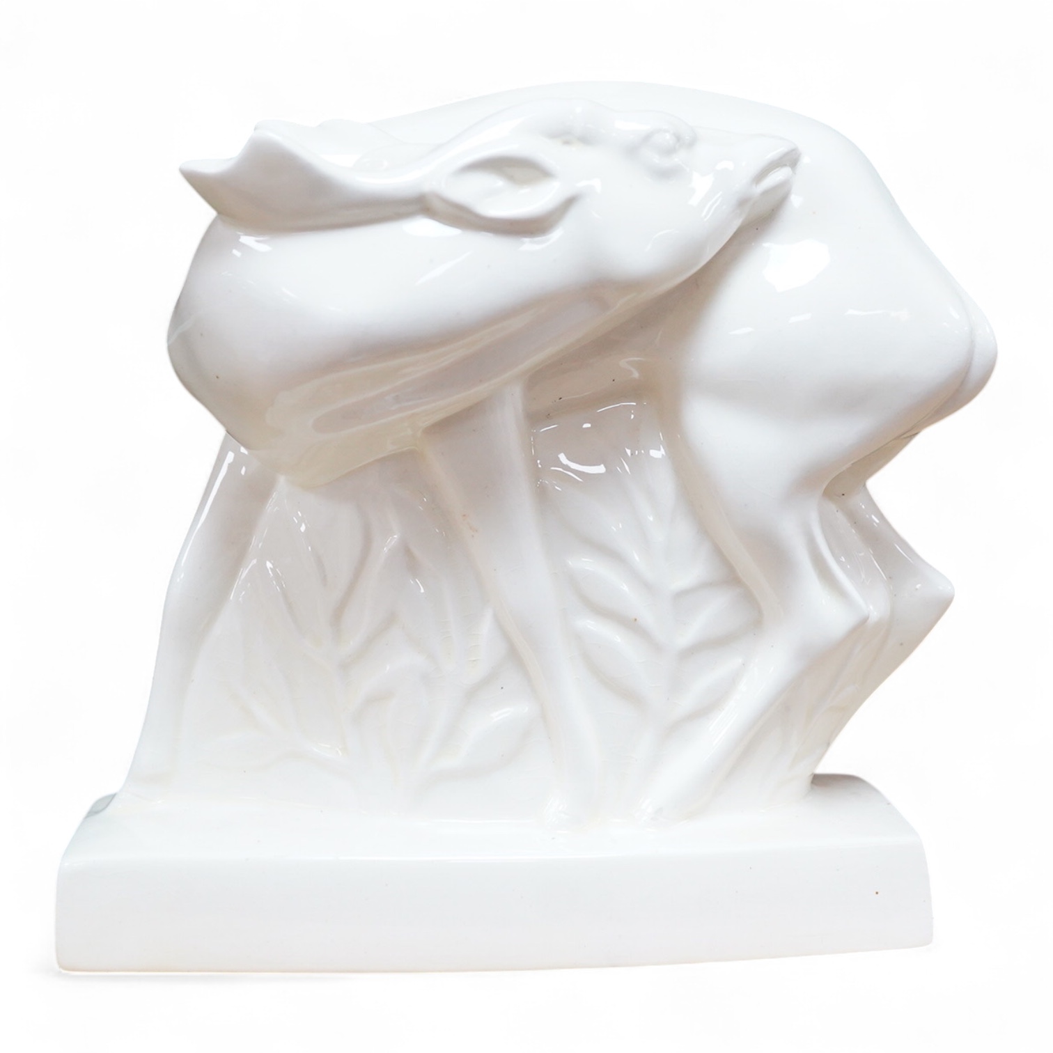 John Skeaping for Wedgwood, an Art deco Fallow deer, cream glazed, 20cm high